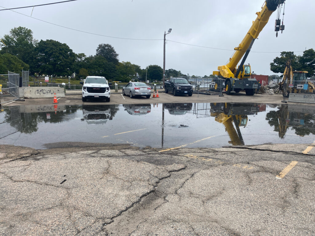 a road with cars and cranes (MyCoast AI)