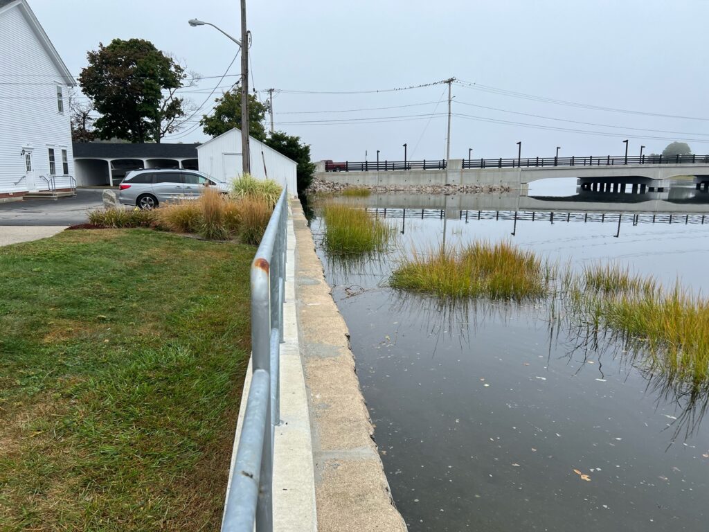 a flooded street with a bridge (MyCoast AI)