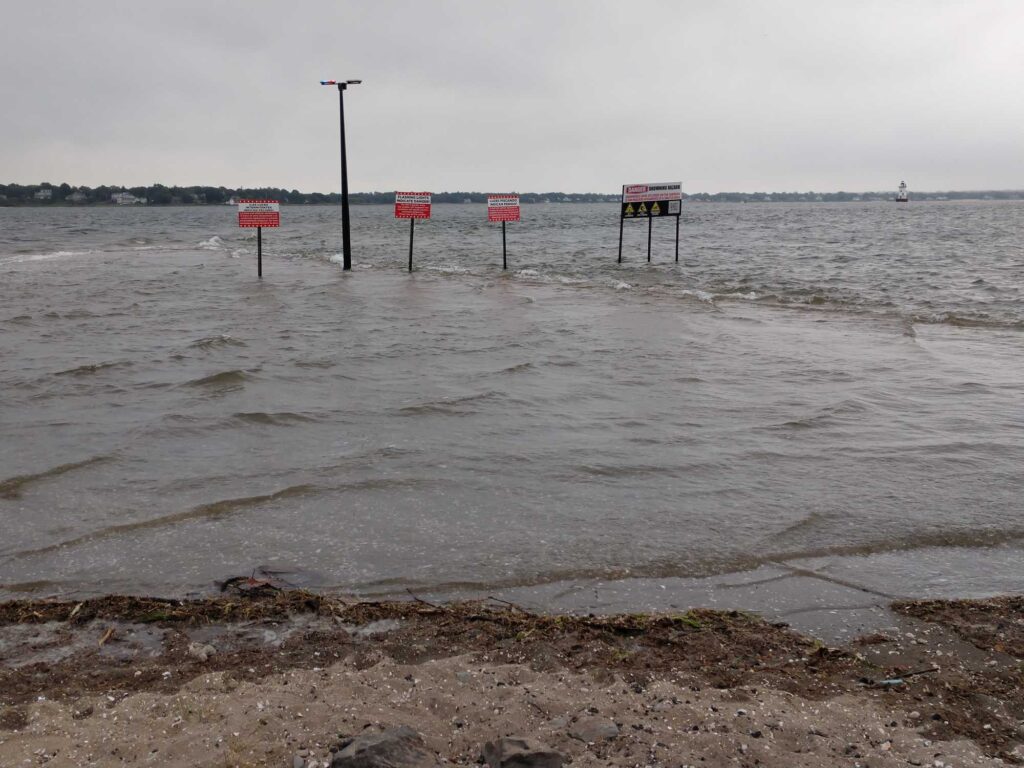 a flooded area with signs (MyCoast AI)