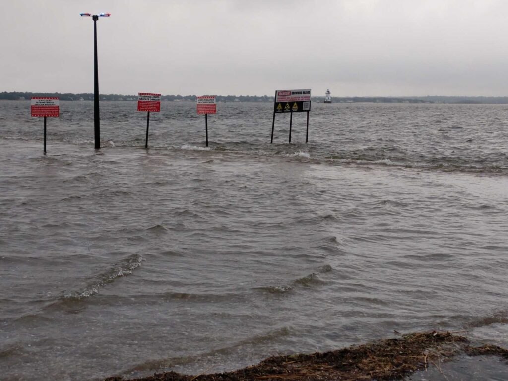 a flooded area with signs (MyCoast AI)