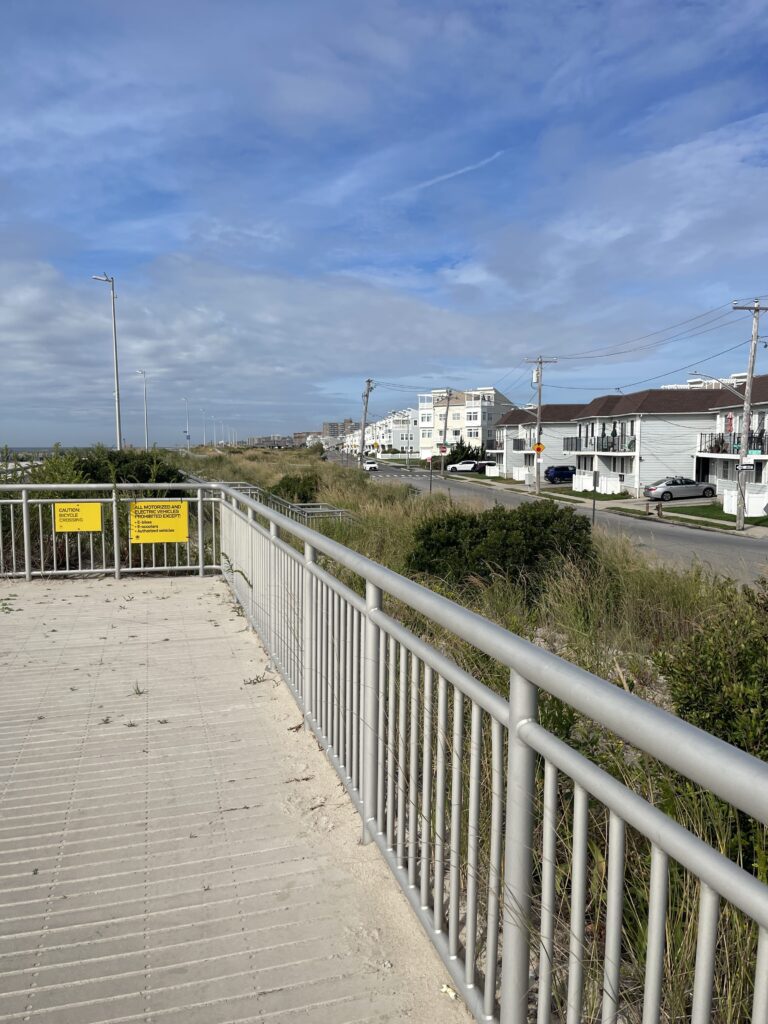 a wooden bridge over a road (MyCoast AI)
