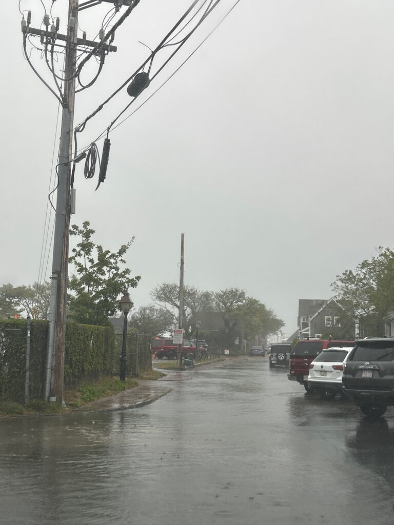 a flooded street with cars (MyCoast AI)