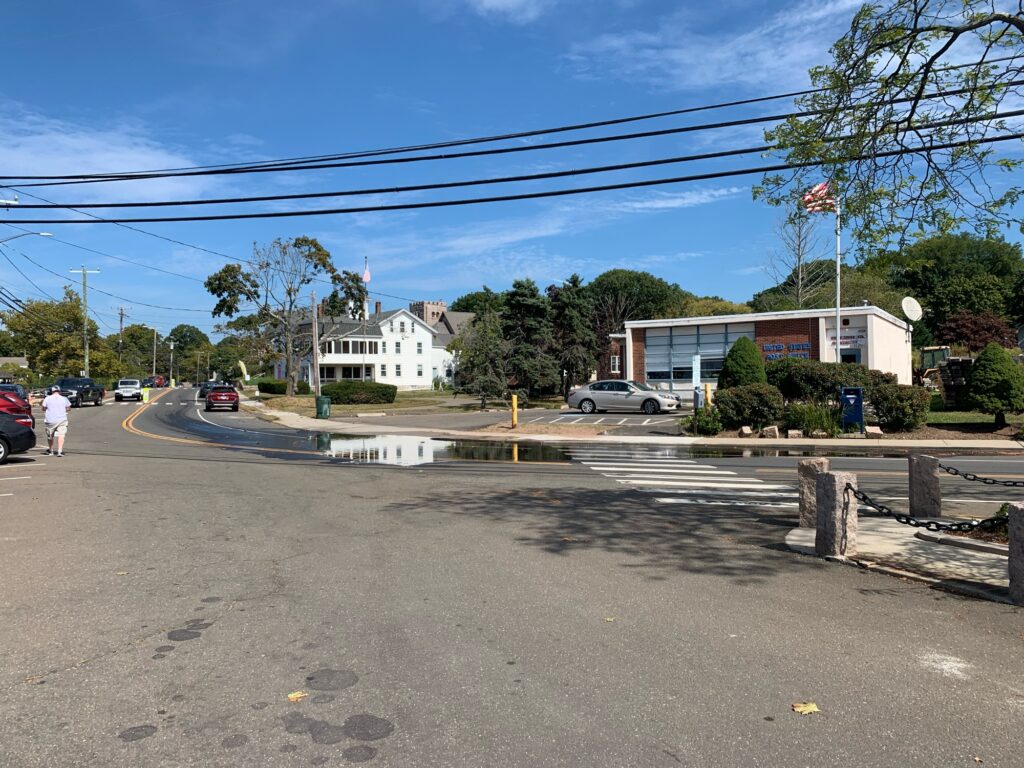 a street with cars and houses (MyCoast AI)