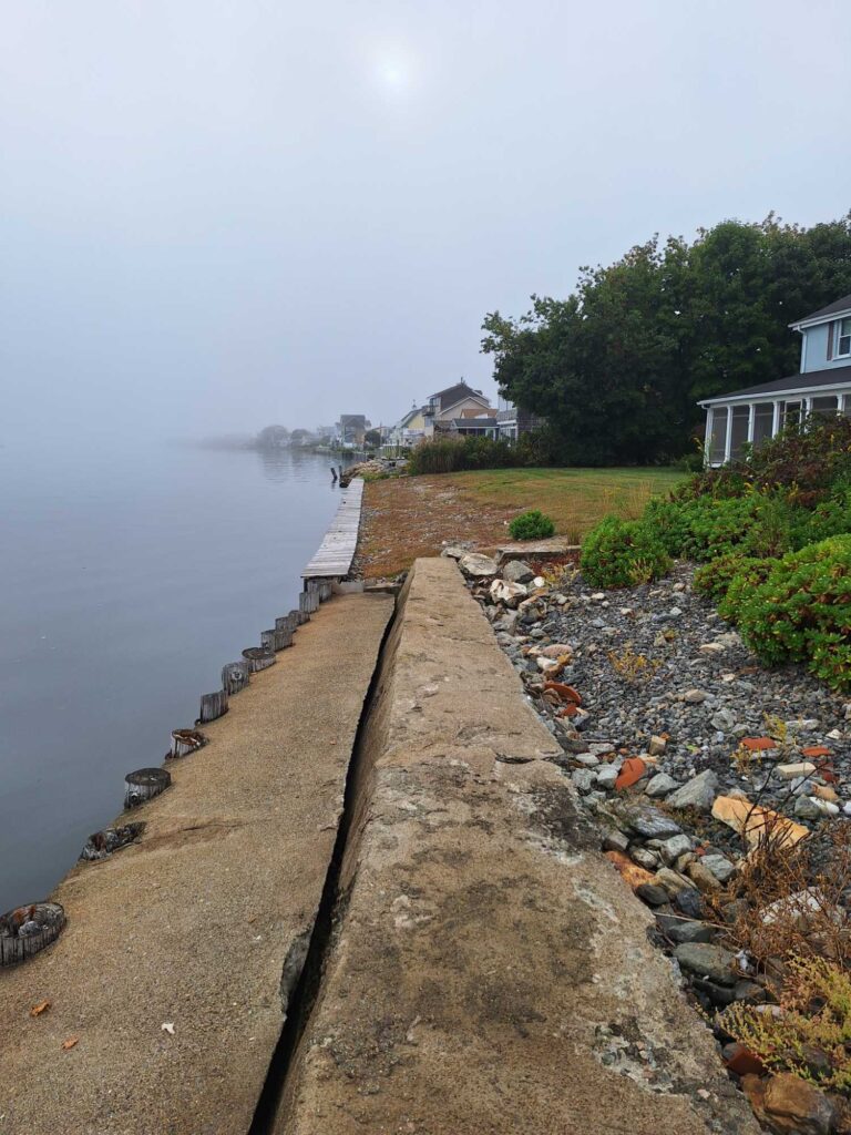 a train track next to a body of water (MyCoast AI)