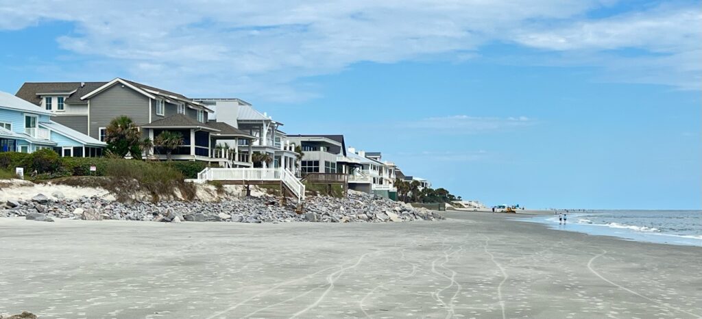 a row of houses on a beach (MyCoast AI)