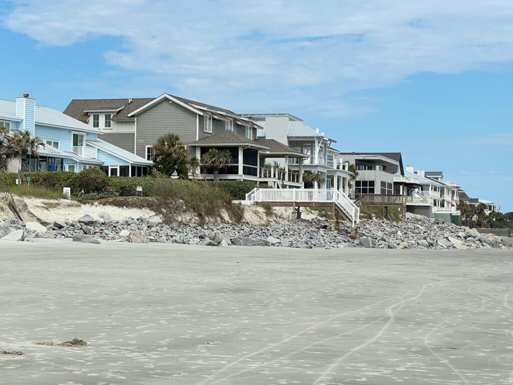 a row of houses on a beach (MyCoast AI)