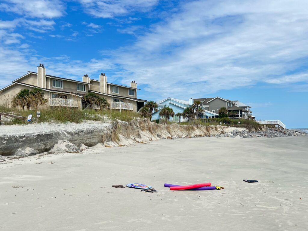 a beach with a few houses (MyCoast AI)