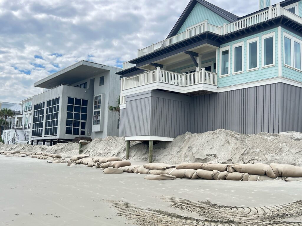 a building with a beach in front of it (MyCoast AI)