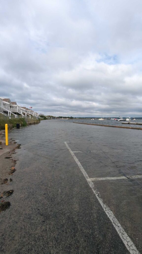 a road next to a body of water (MyCoast AI)