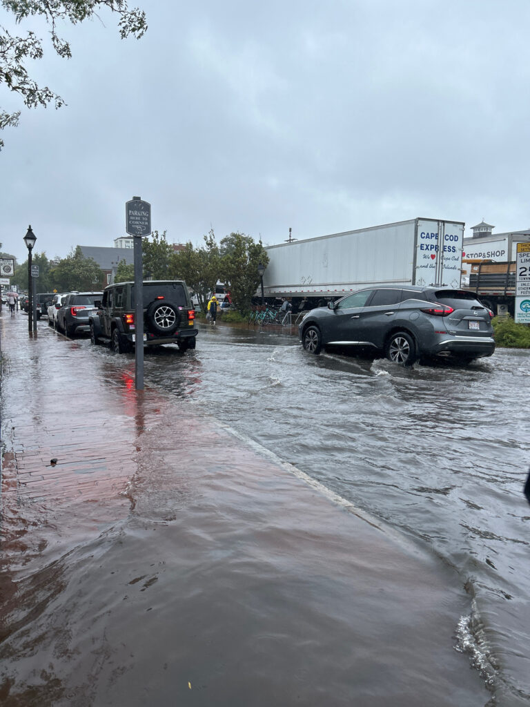 a flooded street with cars (MyCoast AI)
