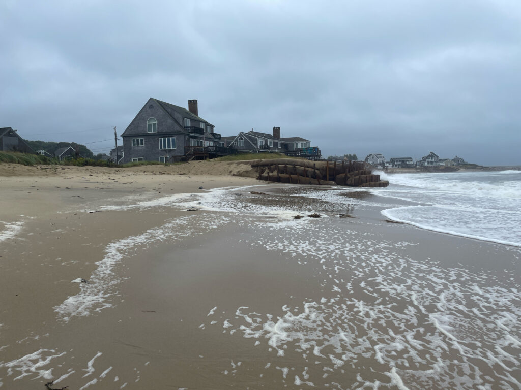 a beach with waves crashing on it (MyCoast AI)