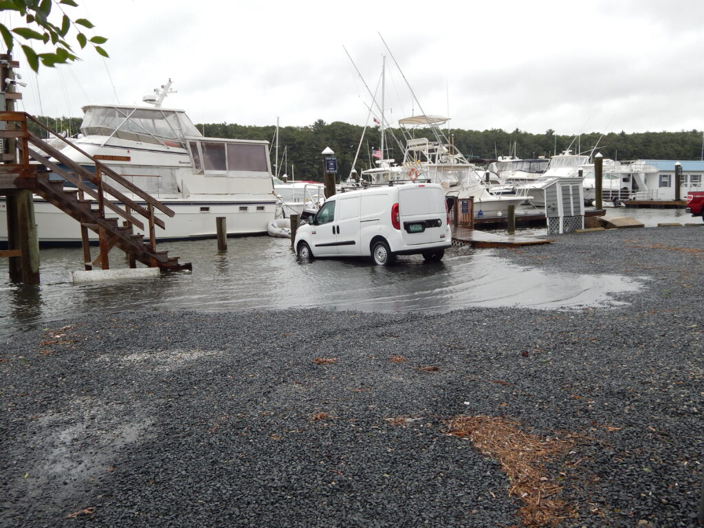 a white van parked on a dock (MyCoast AI)