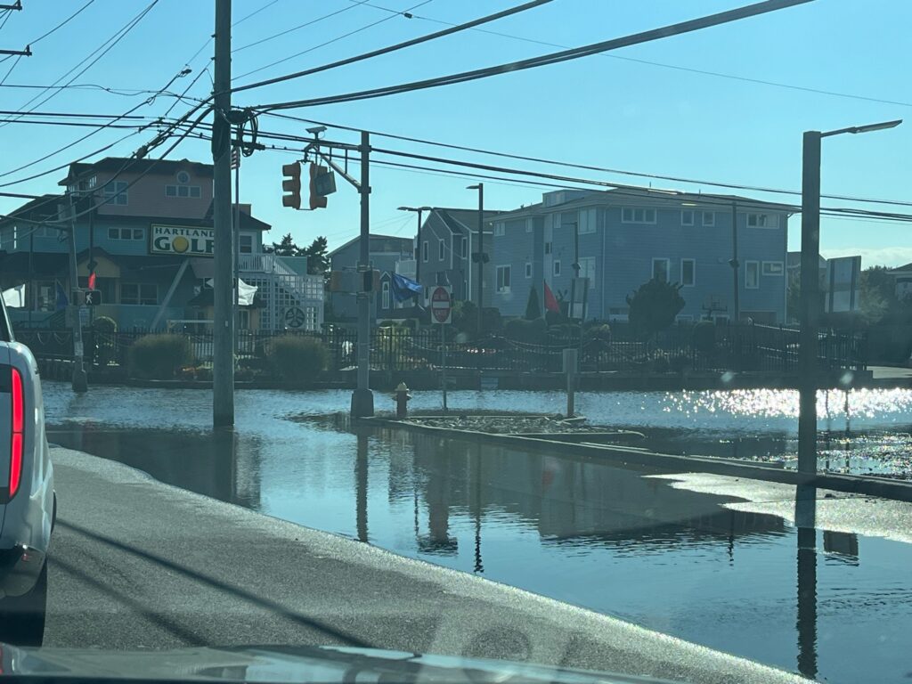 a flooded street with buildings (MyCoast AI)