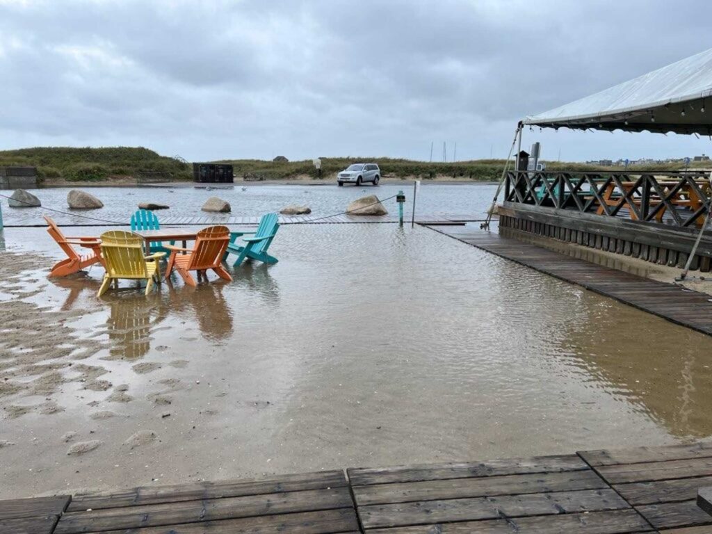 chairs and tables on a dock (MyCoast AI)