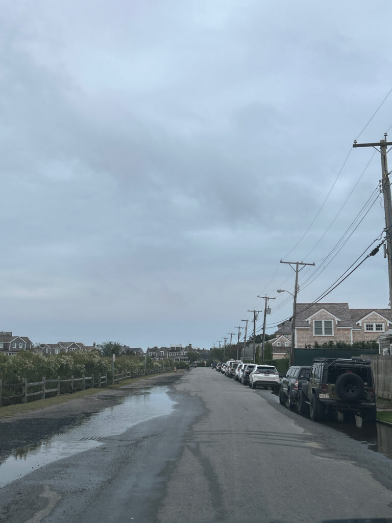 a road with cars parked along it (MyCoast AI)