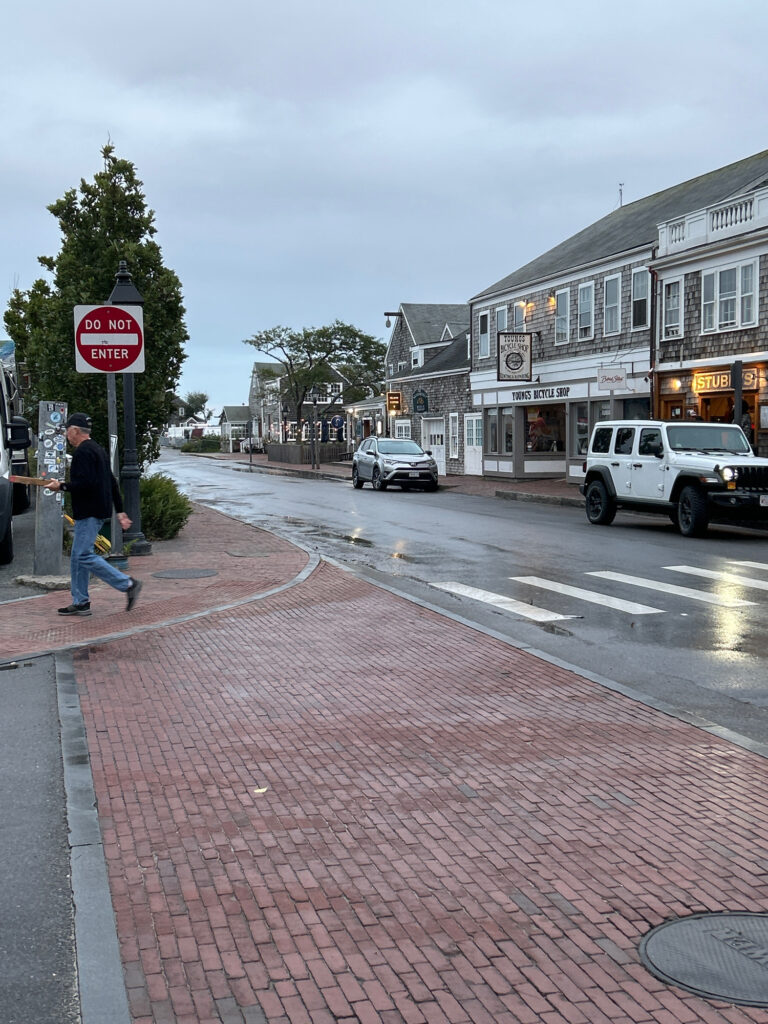 a person walking down a sidewalk (MyCoast AI)
