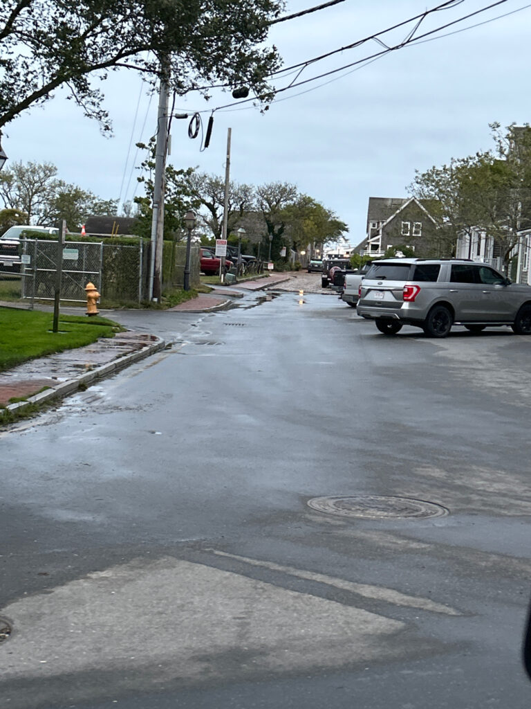 a street with cars and a fire hydrant (MyCoast AI)