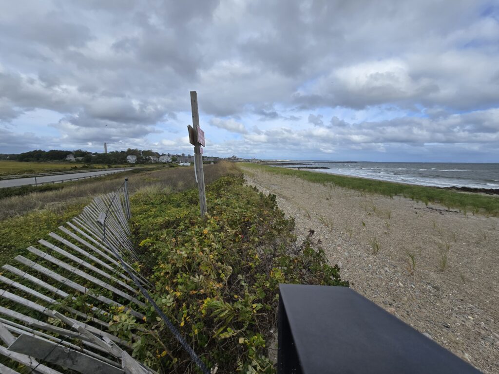 a fence on a beach (MyCoast AI)