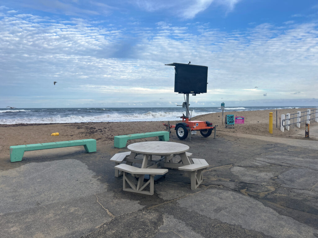 a tractor on a beach (MyCoast AI)