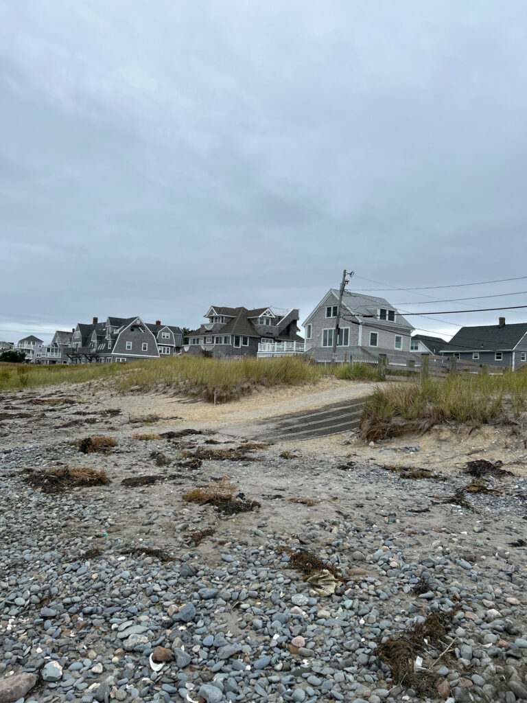 a group of houses by a beach (MyCoast AI)
