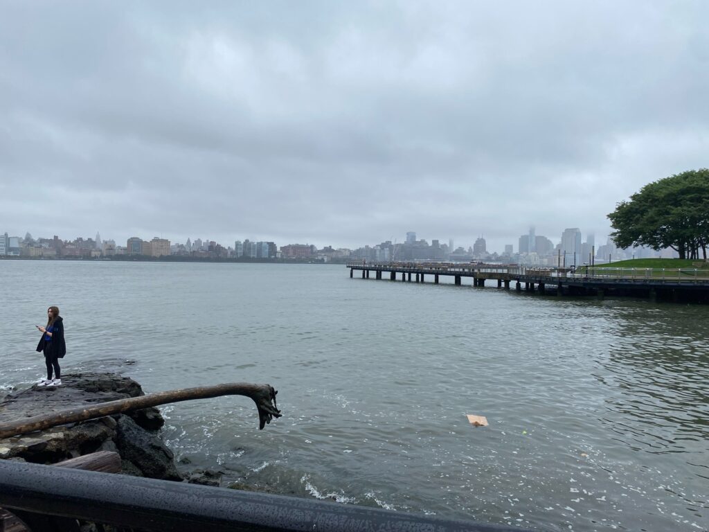 a man standing on a dock (MyCoast AI)