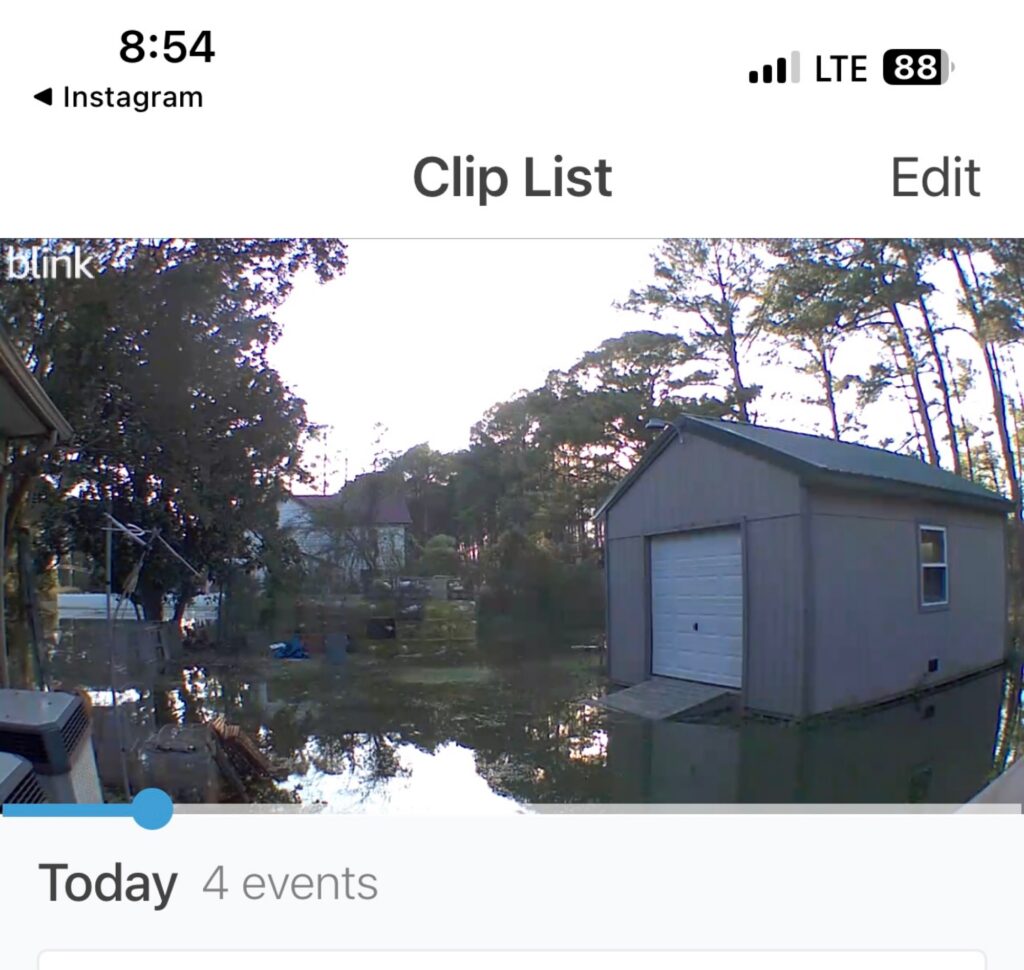 a house with a pond in front of it (MyCoast AI)