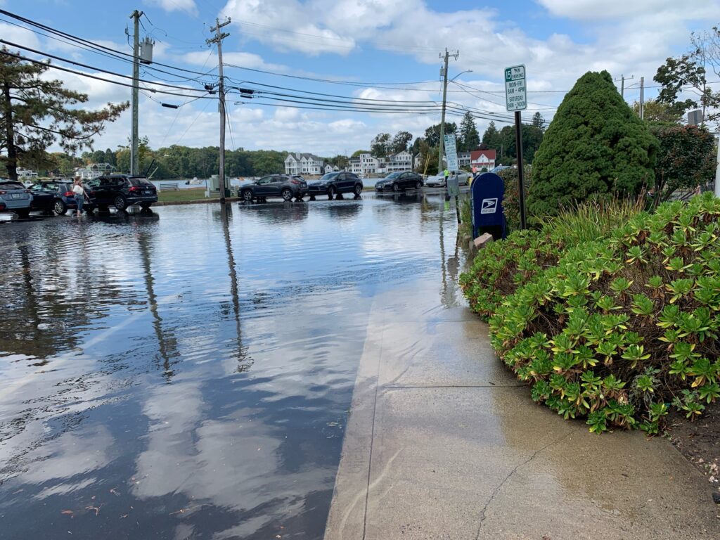 a flooded street with cars (MyCoast AI)