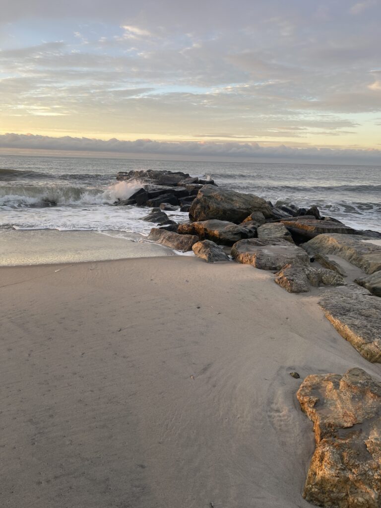 a rocky beach with waves crashing (MyCoast AI)