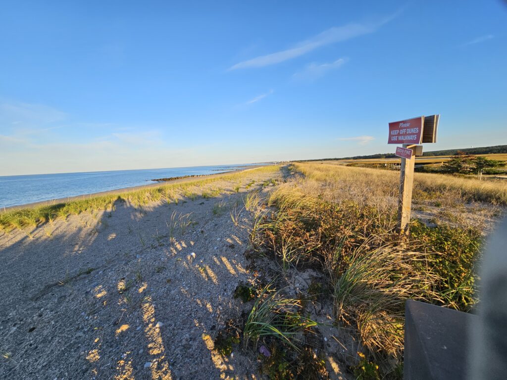a road with a sign on it (MyCoast AI)
