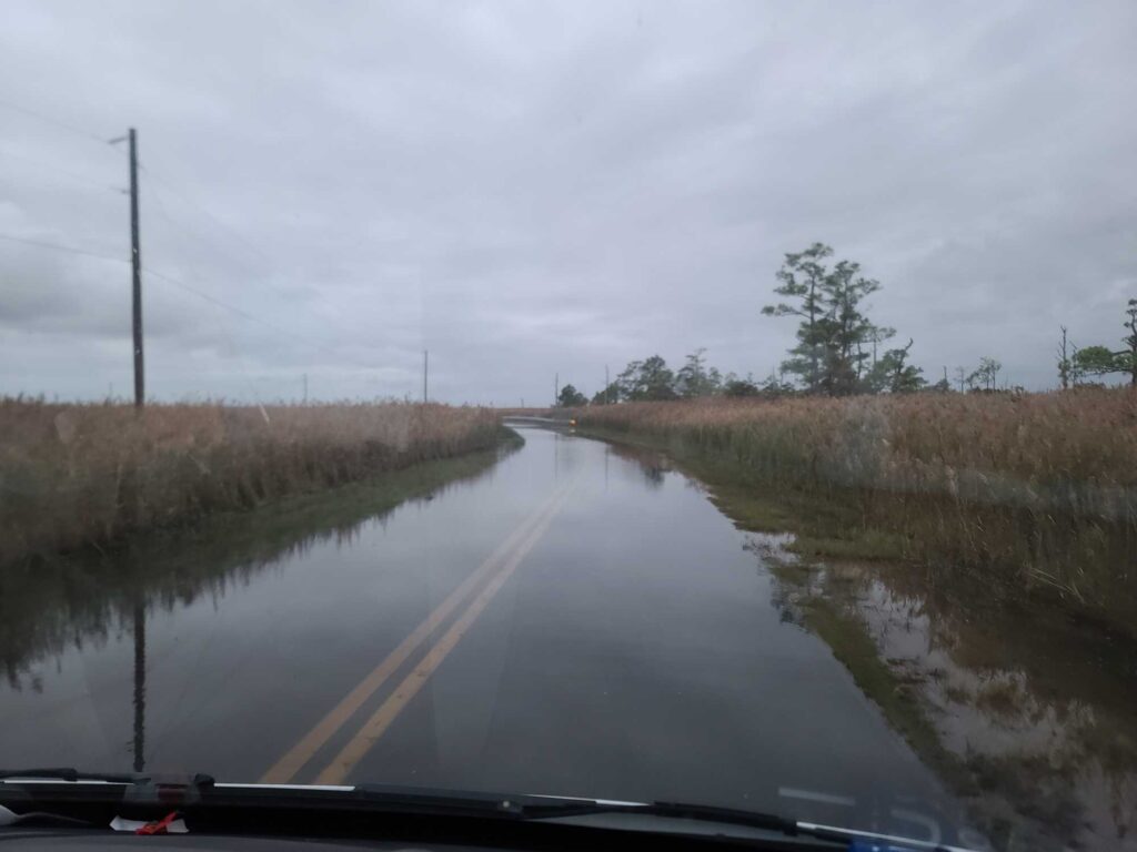 a road with water on the side (MyCoast AI)