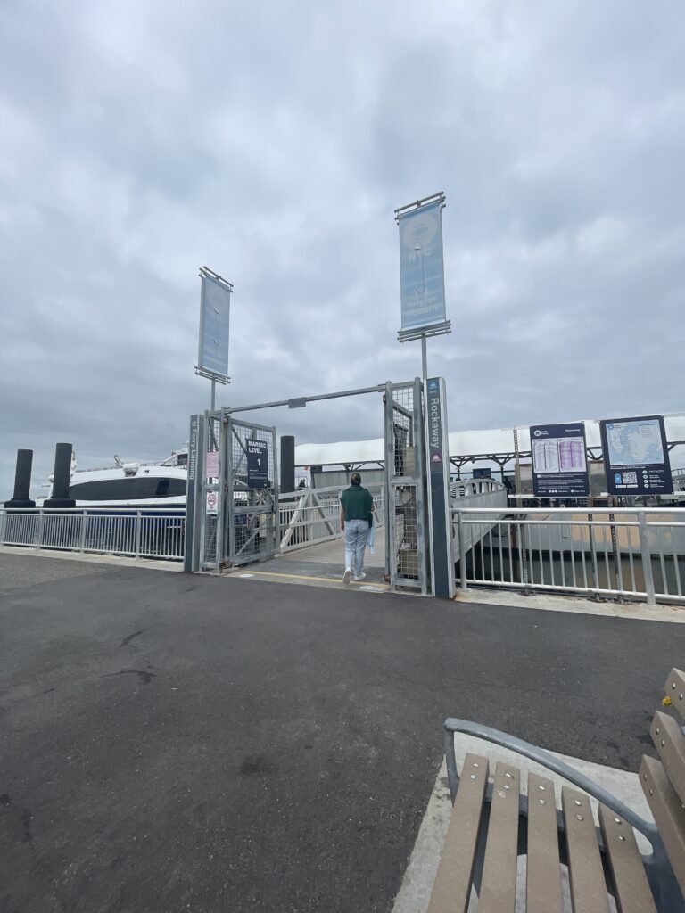 a person walking on a dock (MyCoast AI)