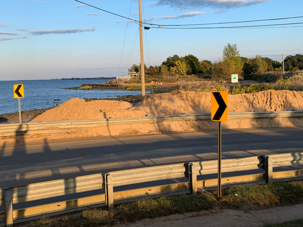 a road with signs on the side (MyCoast AI)