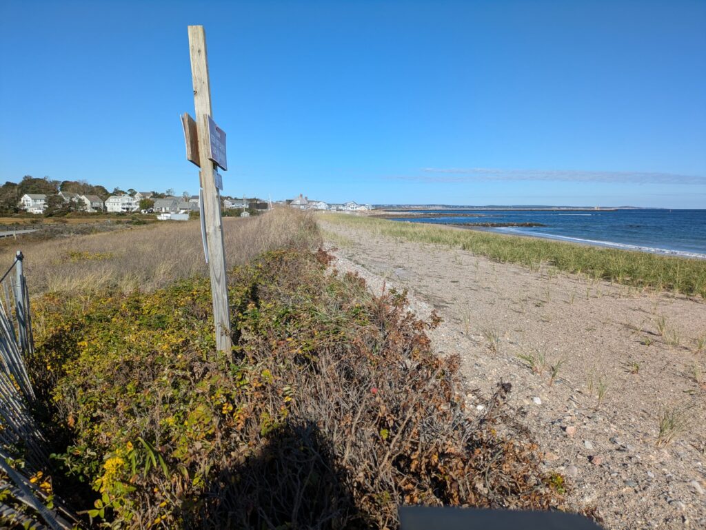 a beach with a sign (MyCoast AI)