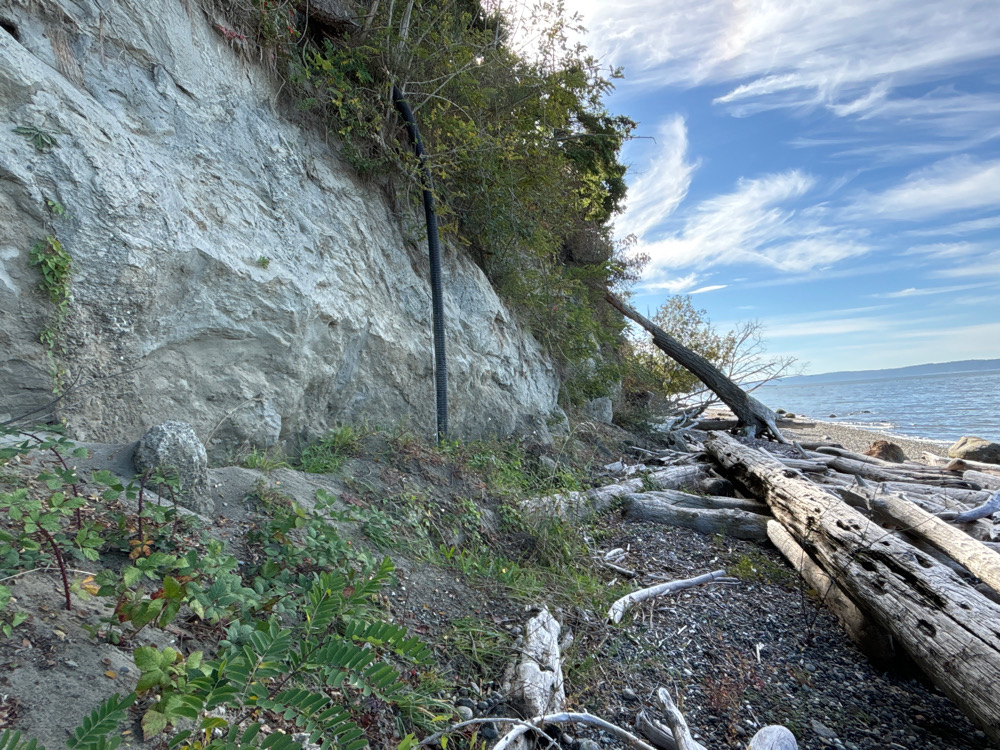 a rocky cliff side with a bicycle (MyCoast AI)