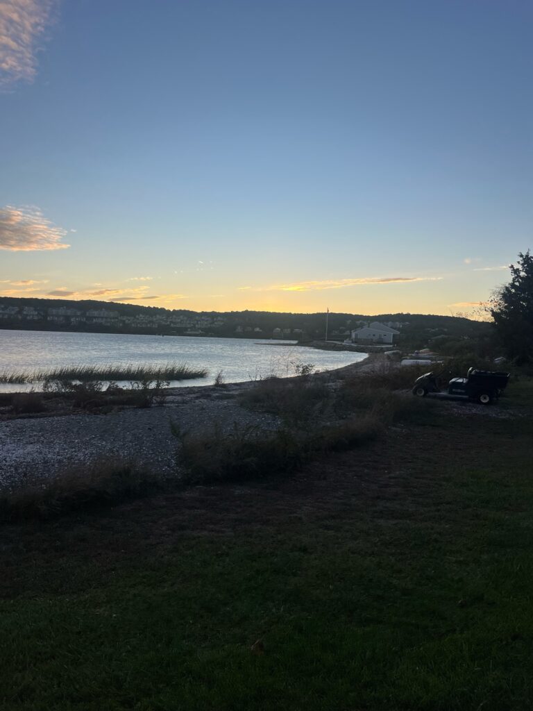 a car parked on a road by a body of water (MyCoast AI)