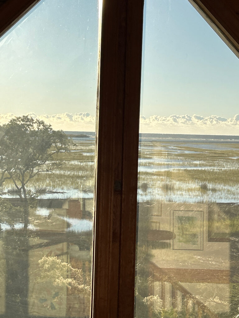 a view of a snowy landscape through a window (MyCoast AI)