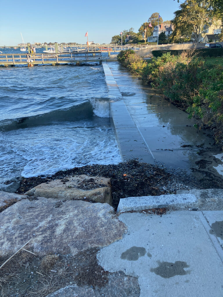a path with rocks and water by a bridge (MyCoast AI)