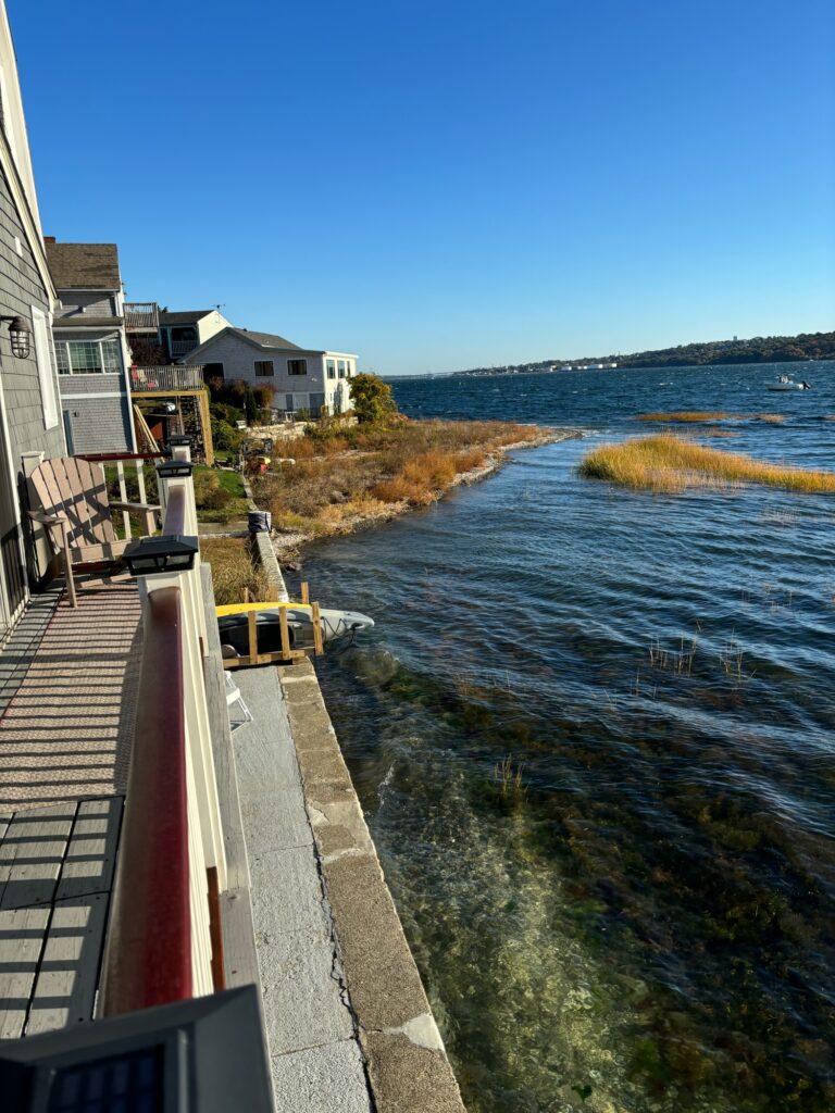 a body of water with buildings along it (MyCoast AI)