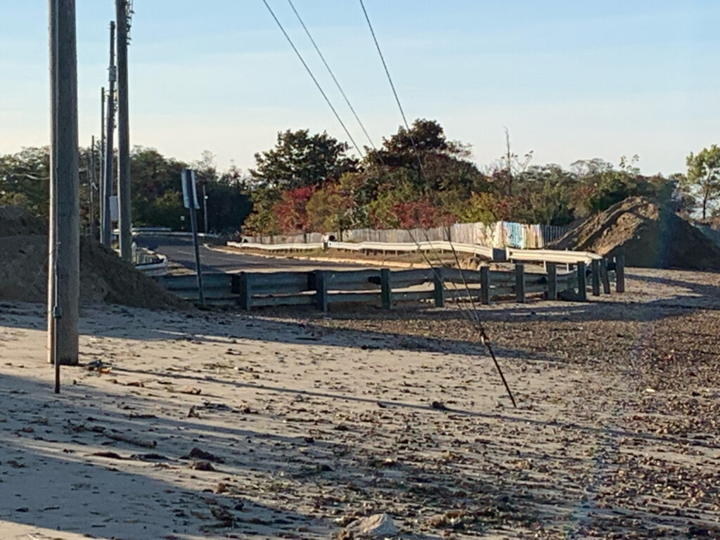 a wooden picnic table on a beach (MyCoast AI)