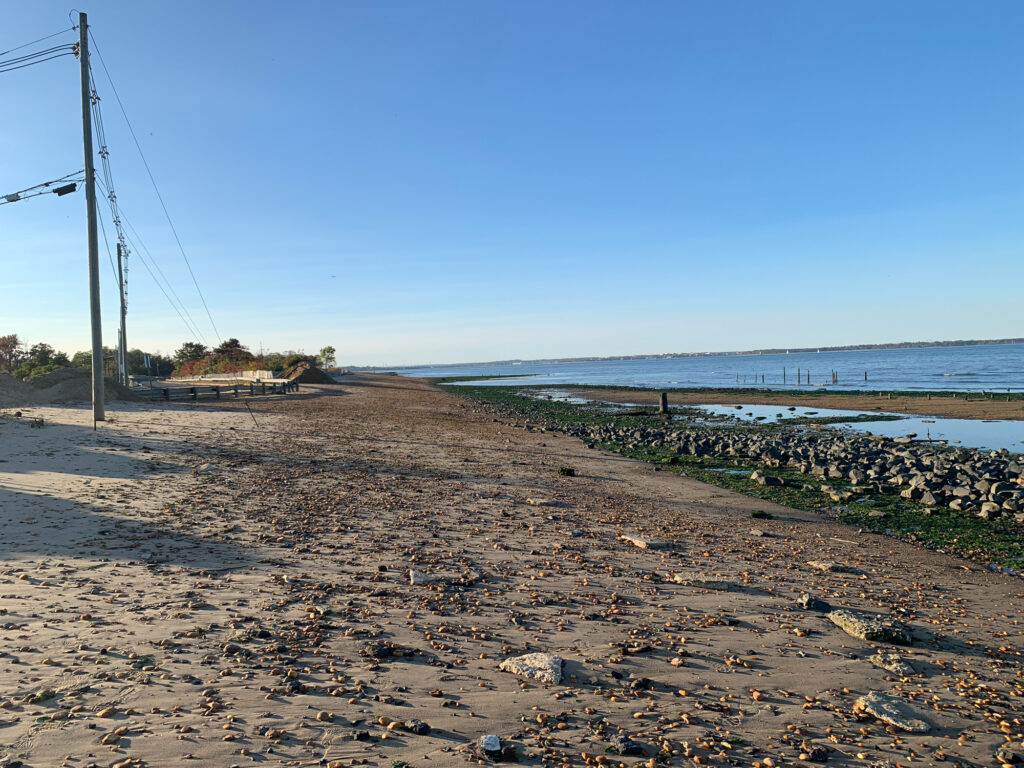 a sandy beach with power lines (MyCoast AI)