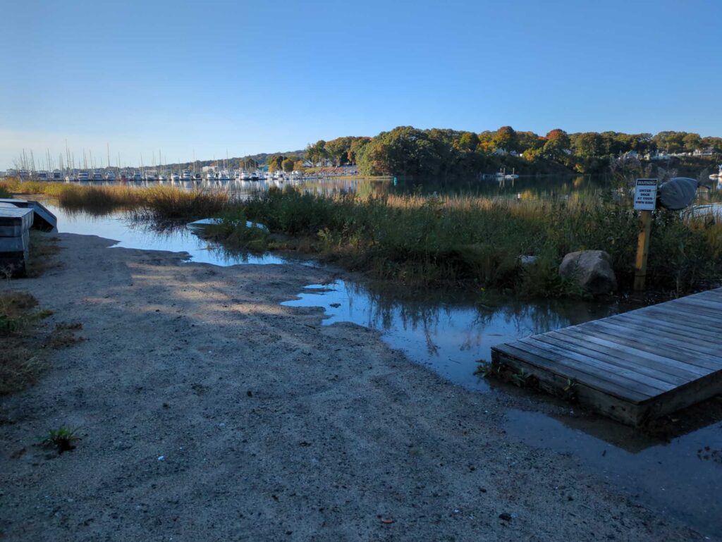 a small pond with a dock (MyCoast AI)