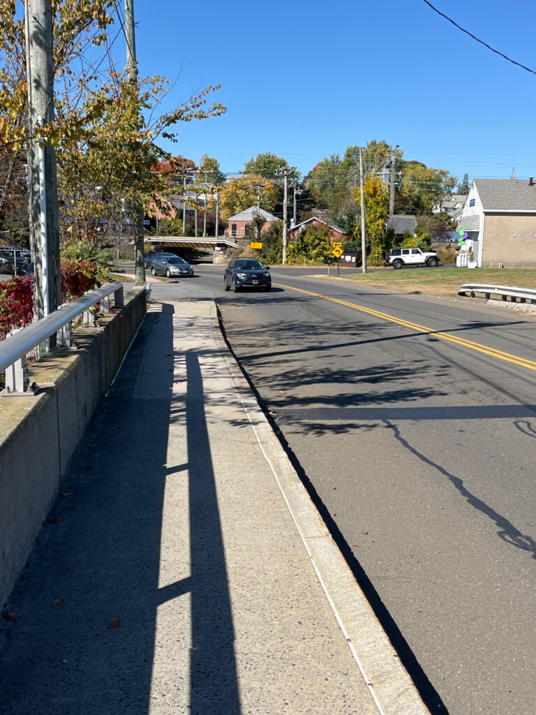 a street with cars on it (MyCoast AI)