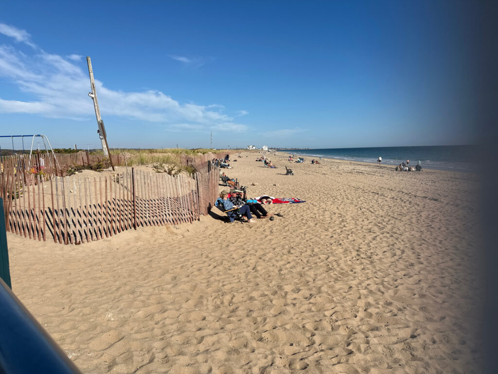 a beach with people on it (MyCoast AI)