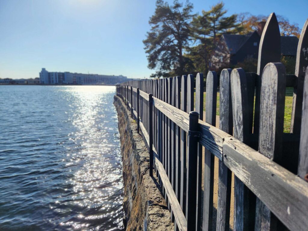 a wooden fence on a dock (MyCoast AI)