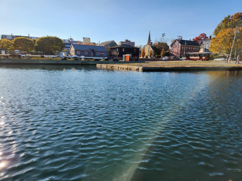 a body of water with buildings along it (MyCoast AI)