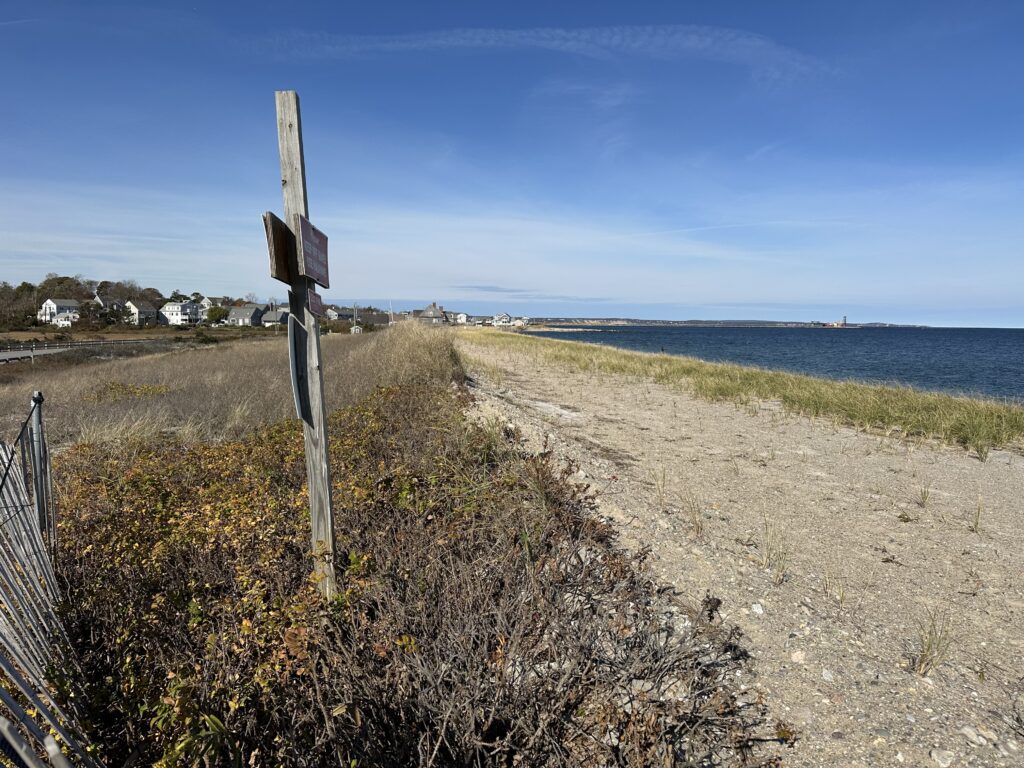 a road with a sign on it (MyCoast AI)