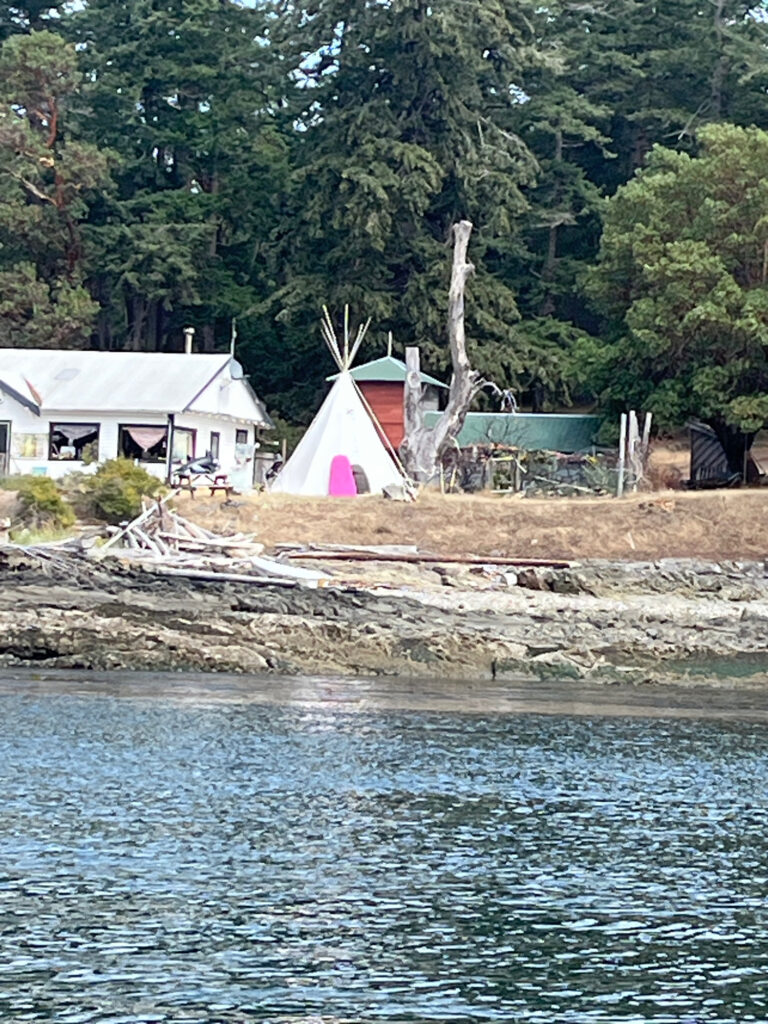 a house on a rocky shore (MyCoast AI)