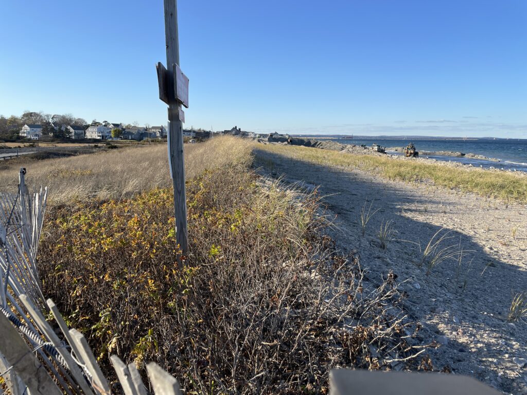 a road with a sign on it (MyCoast AI)
