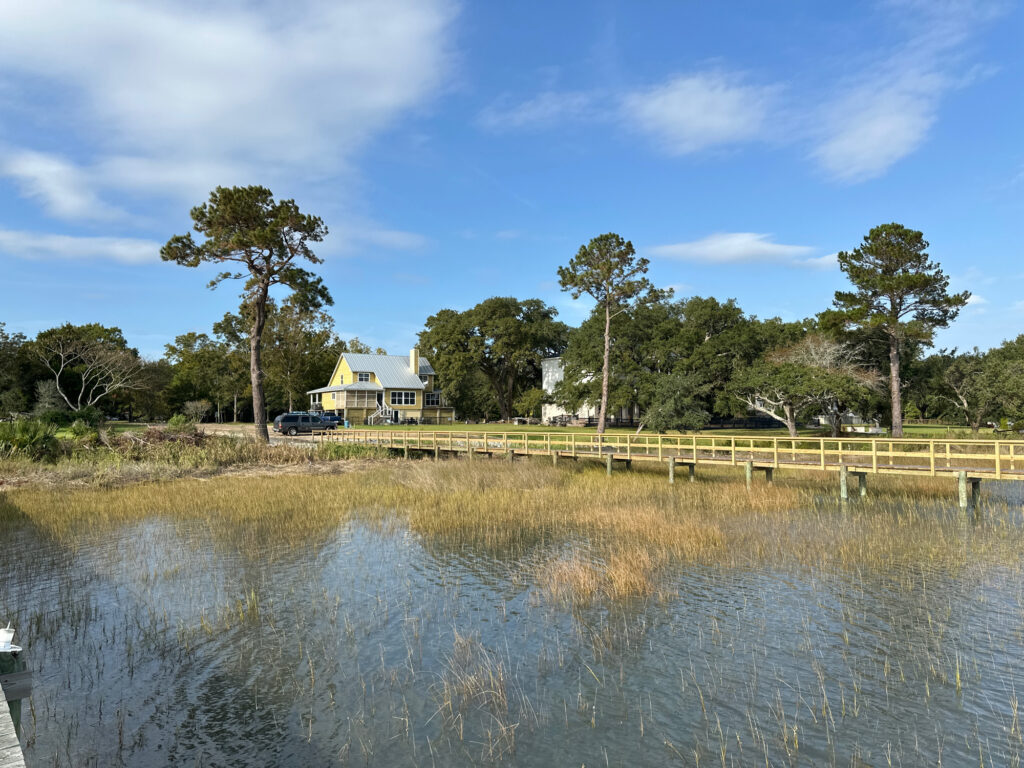 a body of water with a house in the background (MyCoast AI)