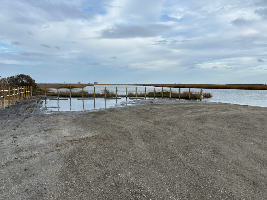 a beach with a pier (MyCoast AI)